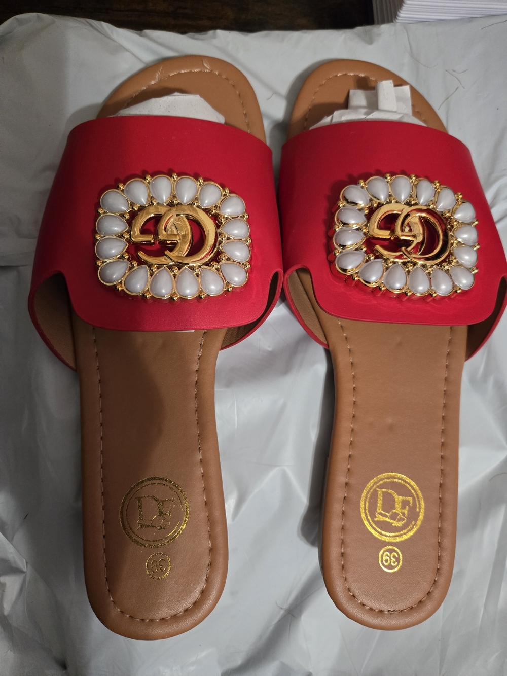 Women’s Red Slide Sandals with Gold Jewel Emblem
